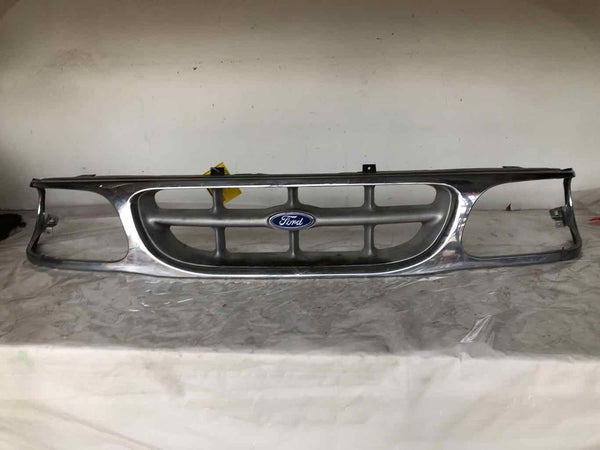 1995 - 2001 FORD EXPLORER Grille Chrome with Headlight Holes And Emblem OEM